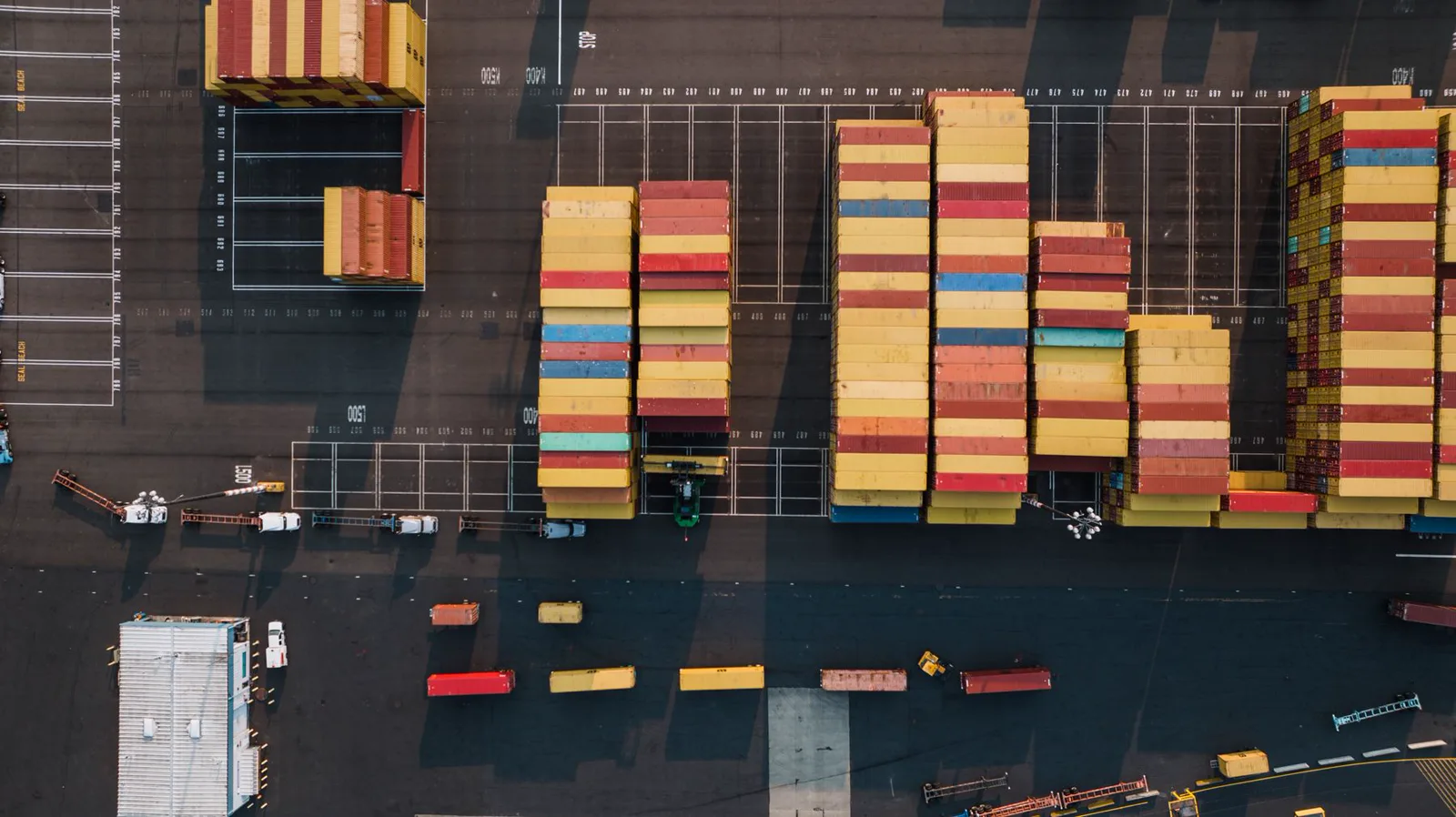 An aerial view of container stacks at an international port