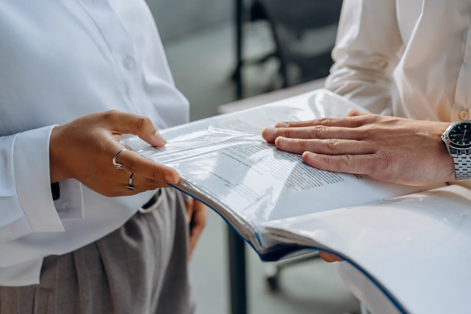 Professionals reviewing business documents together